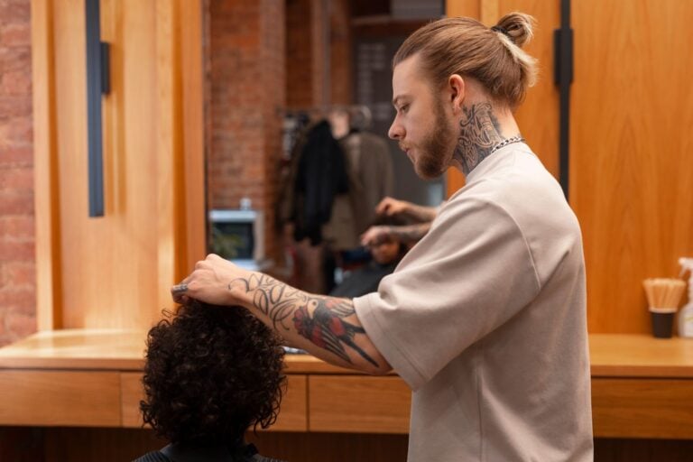 Student working on a client haircut.