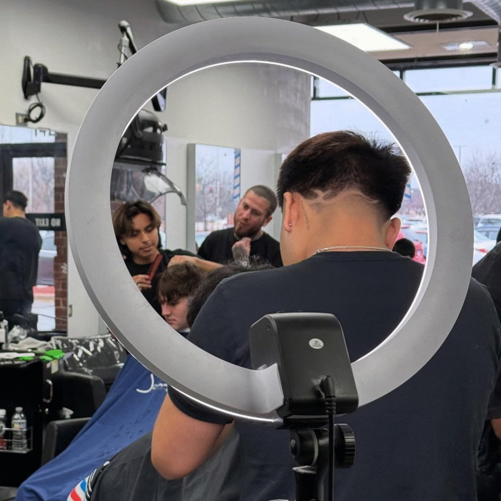 Top Actors Who Have Played Barbers in Hollywood Movies 5 Barber students practicing haircut in Illinois barber school classroom
