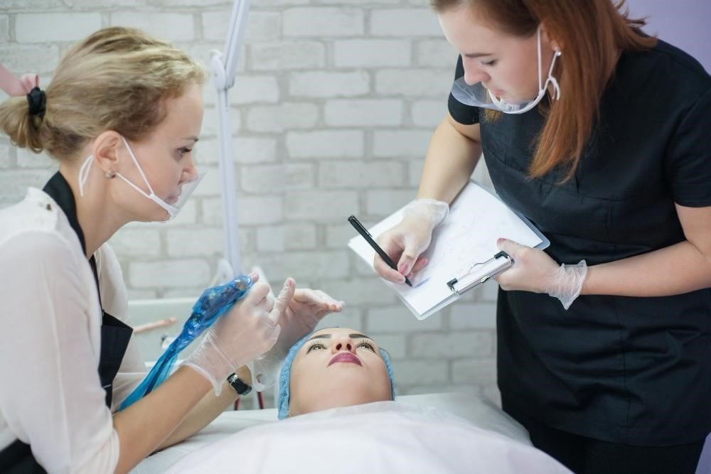 How to Become a Medical Esthetician 2 Students training to become medical estheticians.