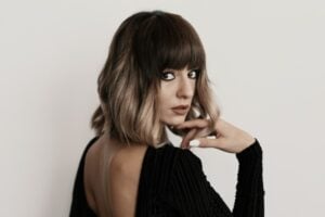 Modern ombre hairstyle with soft gradient color created through professional hair styling and coloring training at CSA, beauty school in Illinois