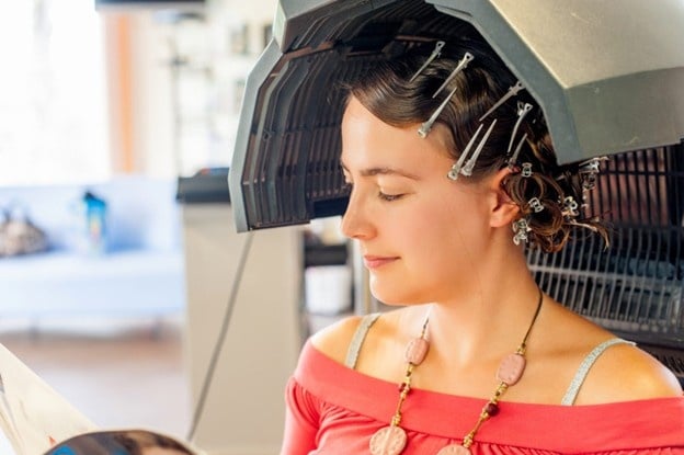 hair perm treatment realized by a cosmetology student at Cosmetology and Spa Academy