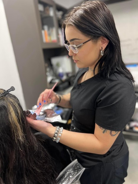 Oil Slick Hair Color for Brunettes: Full Hair Styling Guide 2 cosmetology school student practicing oil slick hair techniques