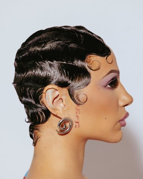 Close-up of finger waves hairstyle showing defined S-shaped waves on short hair, vintage glam look